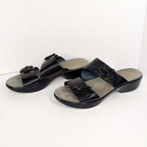 Dansko Black Leather Slide Sandals with Floral Appliqué